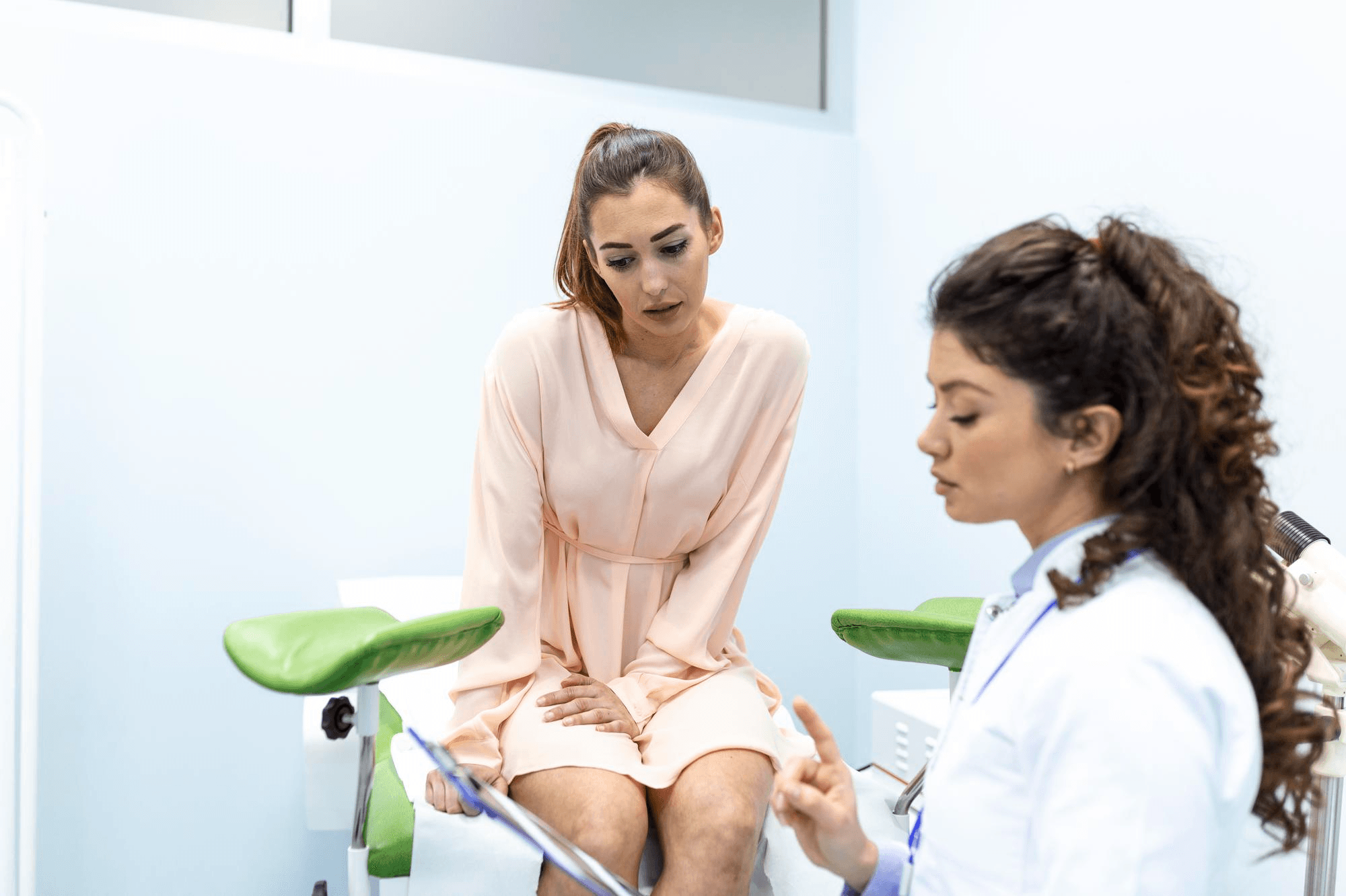 Woman in a consultation with the doctor to discuss a hysterectomy and its procedure.