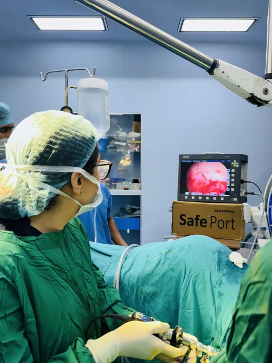 Dr. Shachi Singh performing surgical steps with advanced laparoscopic instruments